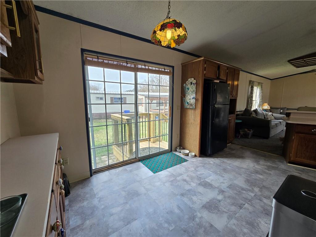 540 Finks Run Road McDonald, PA 15057 - Photo 15 of 39 a view of an empty room with a stove and a window