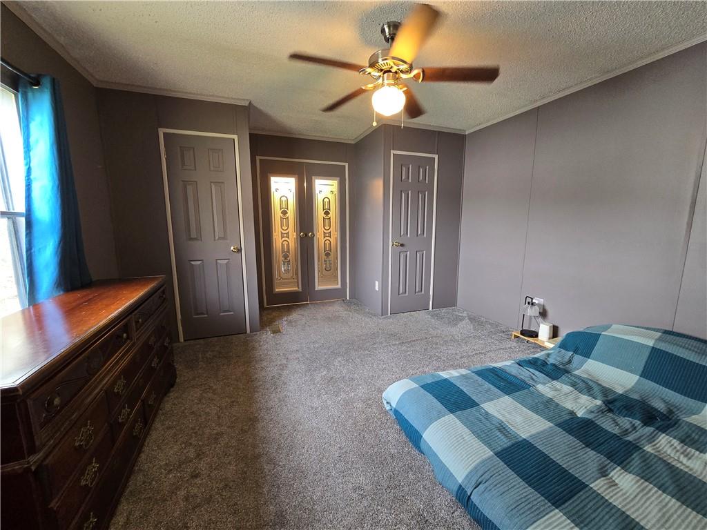 540 Finks Run Road McDonald, PA 15057 - Photo 17 of 39 a bedroom with furniture and a chandelier