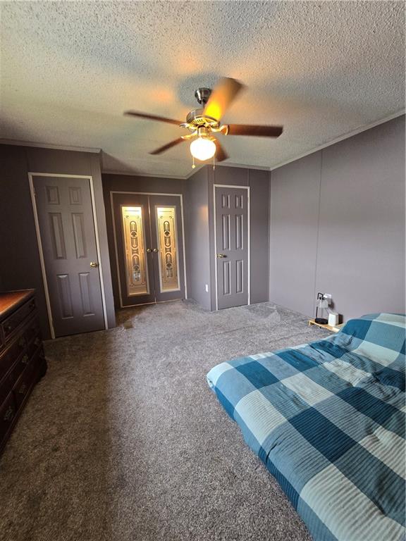 540 Finks Run Road McDonald, PA 15057 - Photo 18 of 39 a bedroom with a bed and a chandelier