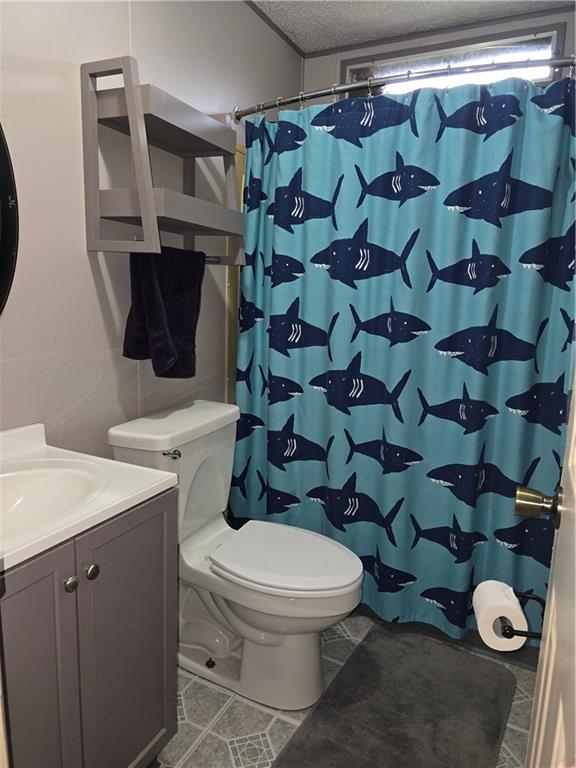 540 Finks Run Road McDonald, PA 15057 - Photo 26 of 39 a white toilet sitting next to a bathroom sink