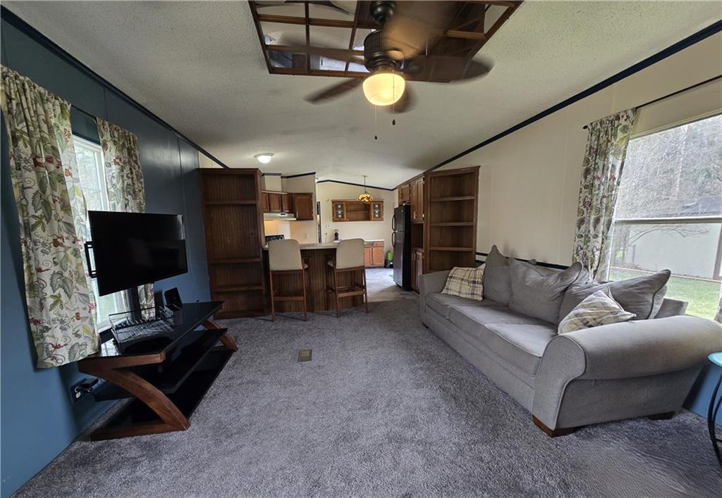 540 Finks Run Road McDonald, PA 15057 - Photo 5 of 39 a living room with furniture and a flat screen tv