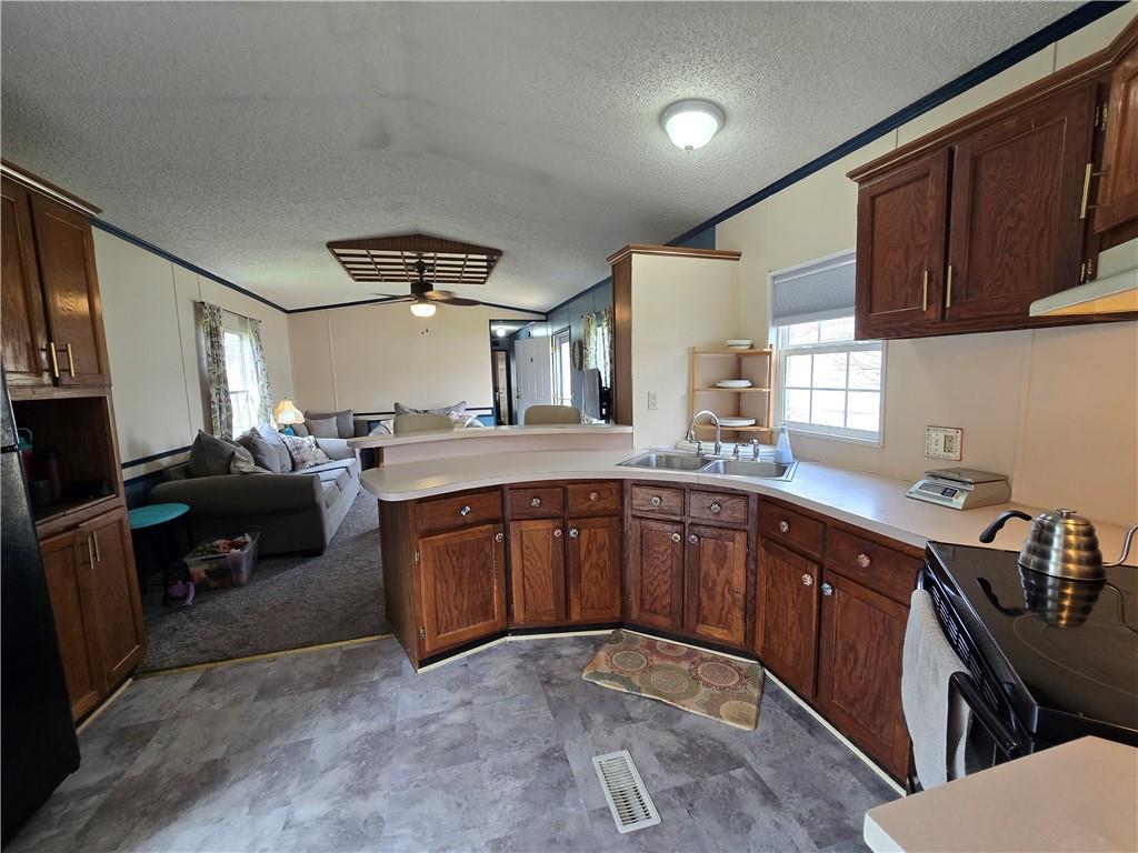 540 Finks Run Road McDonald, PA 15057 - Photo 8 of 39 a kitchen with a sink cabinets and window