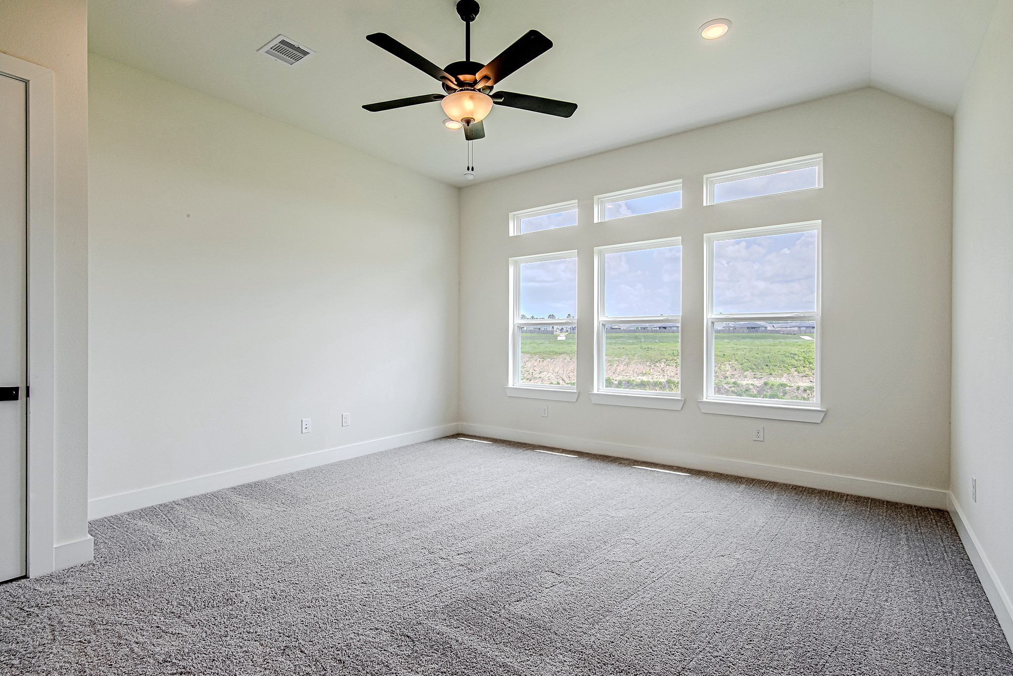 157 Peninsula Point Drive Montgomery, TX 77356 - Photo 14 of 33 a view of an empty room with a window