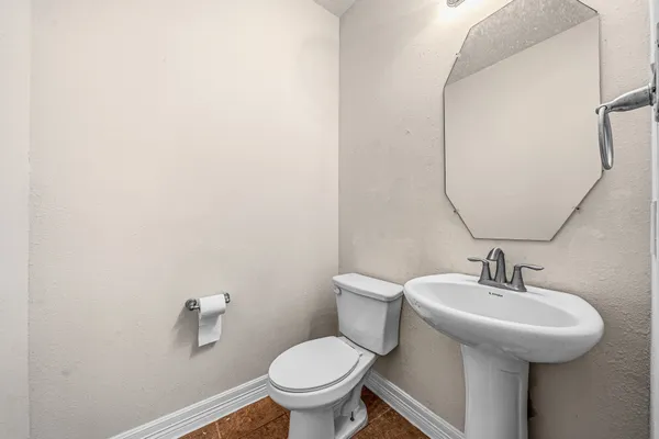 a bathroom with a sink and a toilet