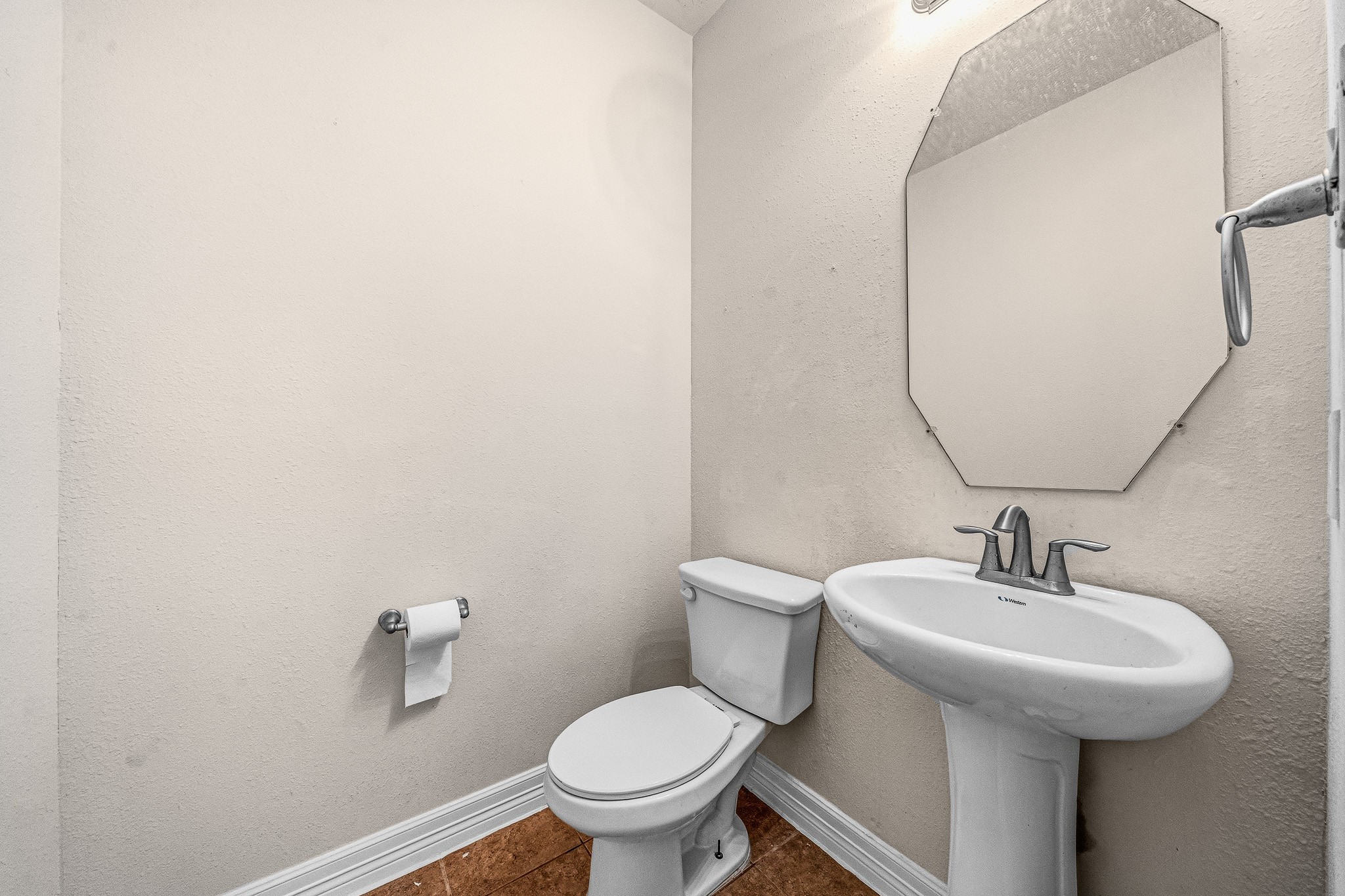 22922 Jetty Manor Lane Spring, TX 77373 - Photo 14 of 46 a bathroom with a sink and a toilet