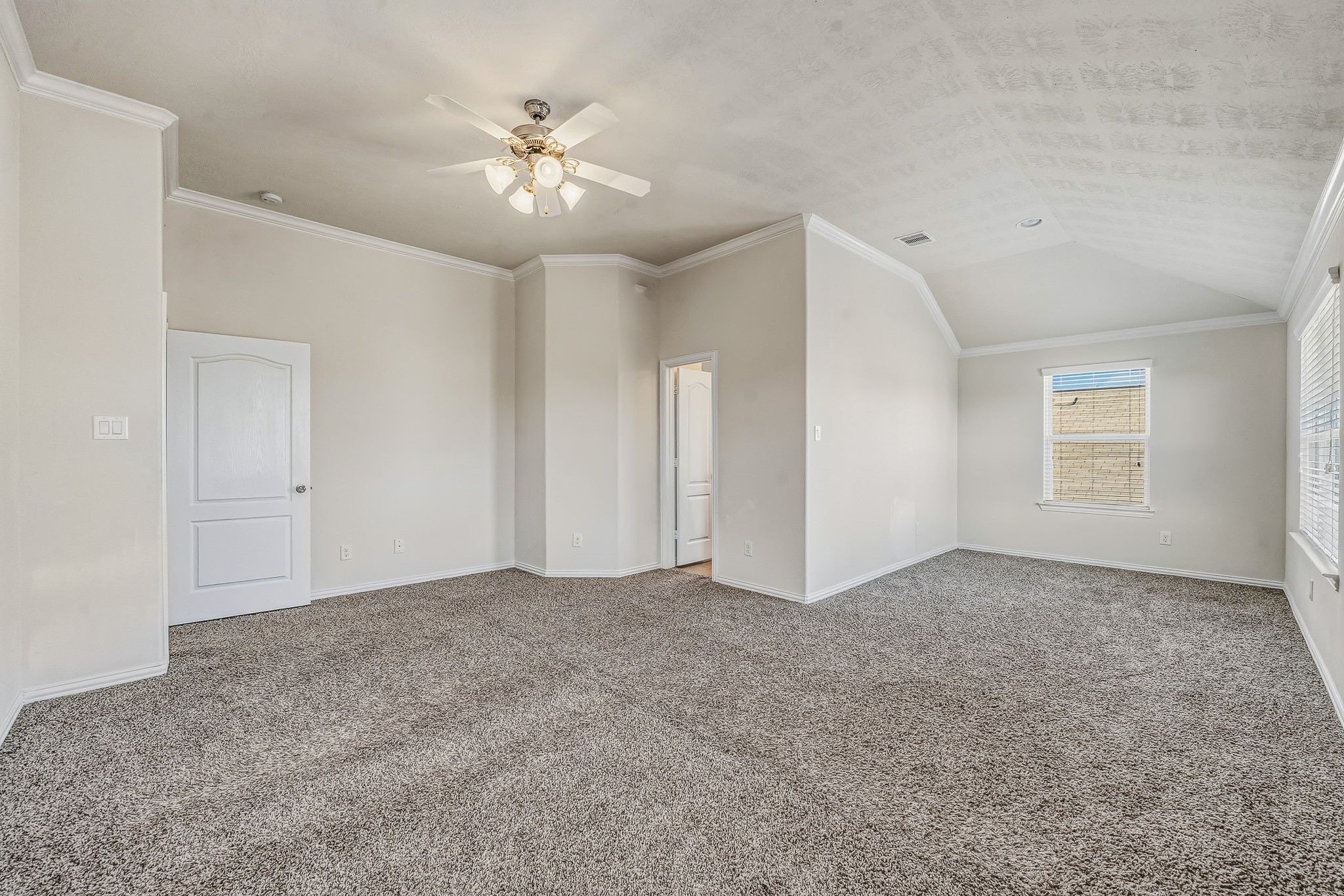 22922 Jetty Manor Lane Spring, TX 77373 - Photo 19 of 46 a view of an empty room with a ceiling fan