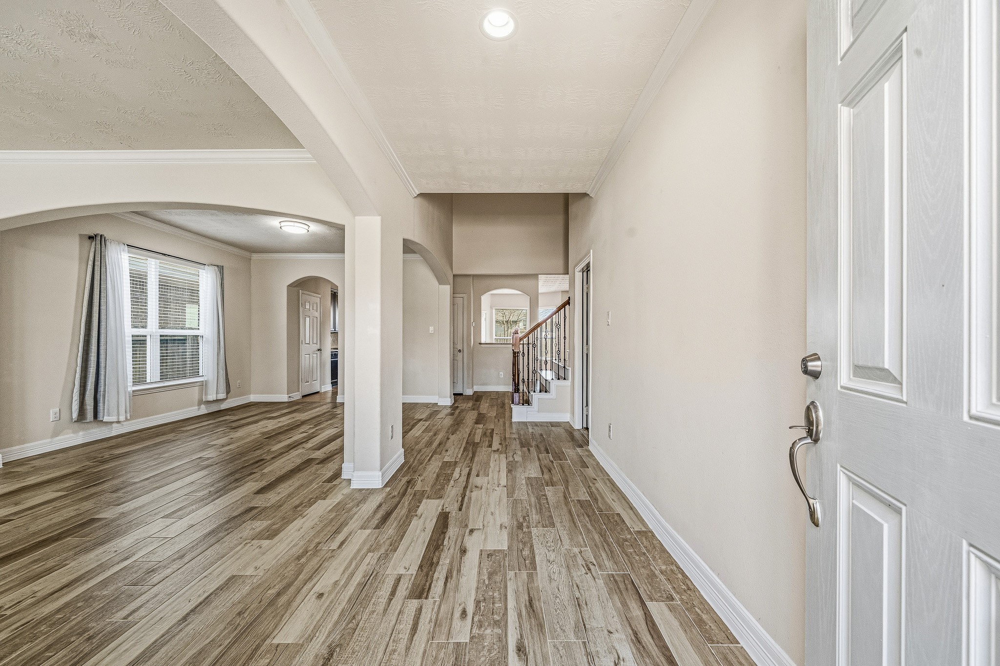22922 Jetty Manor Lane Spring, TX 77373 - Photo 3 of 46 a view of a room with wooden floor