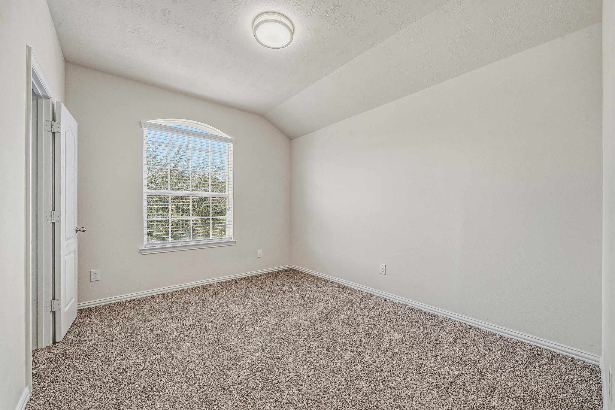 22922 Jetty Manor Lane Spring, TX 77373 - Photo 31 of 46 an empty room with a window