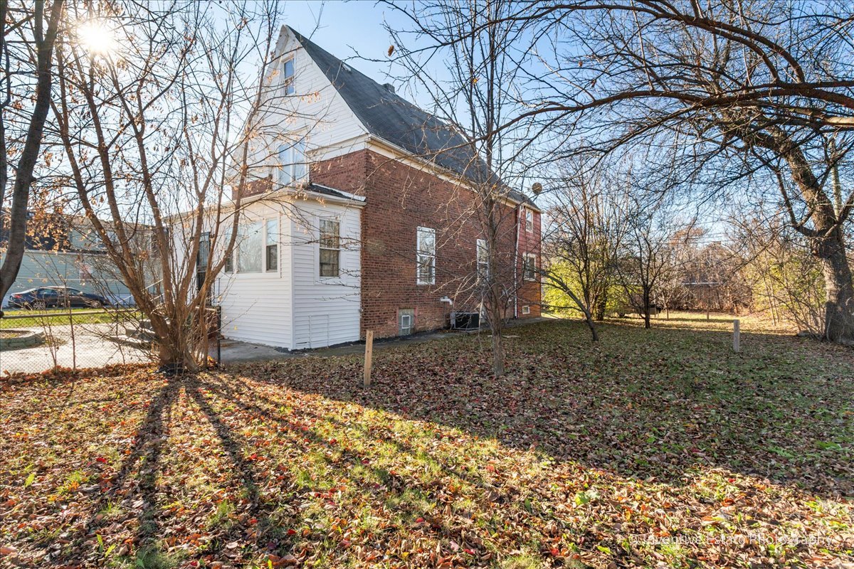 12018 South Loomis Street Chicago, IL 60643 - Photo 2 of 21 a backyard of a house with lots of green space