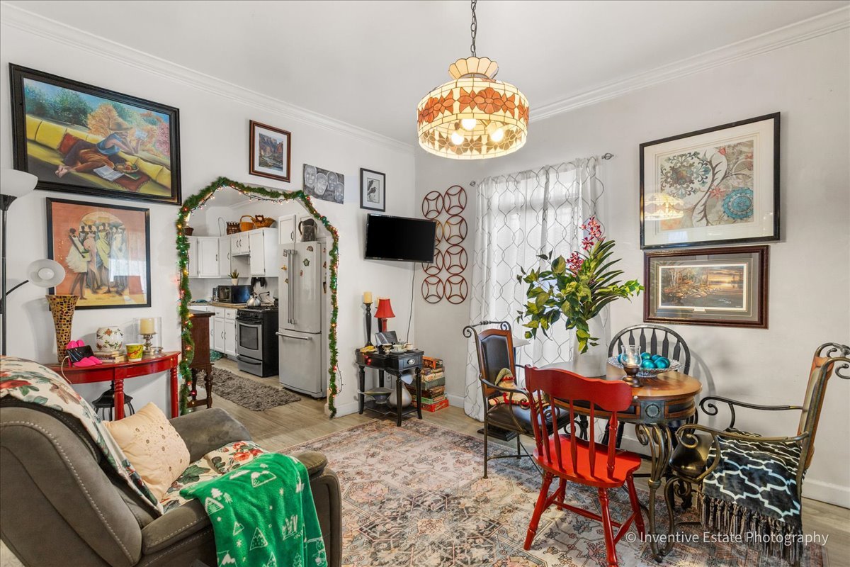 12018 South Loomis Street Chicago, IL 60643 - Photo 8 of 21 a view of a dining room with furniture and a chandelier