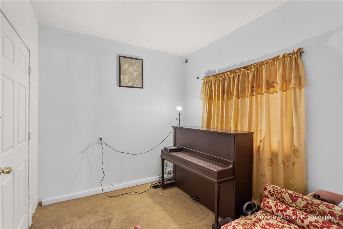 12018 South Loomis Street Chicago, IL 60643 - Photo 10 of 21 a room with furniture and a window