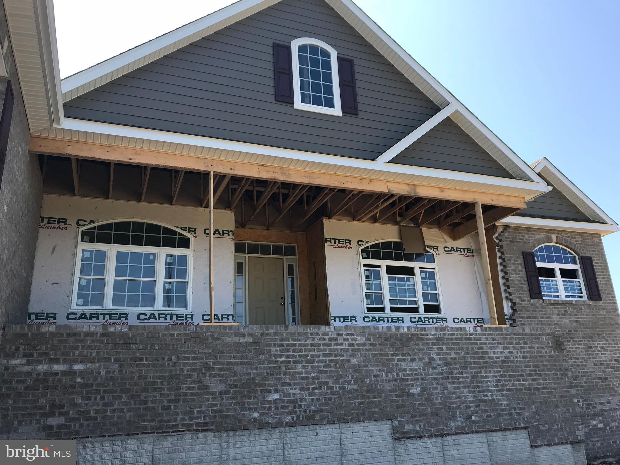 Front to have curved dramatic brick stairs