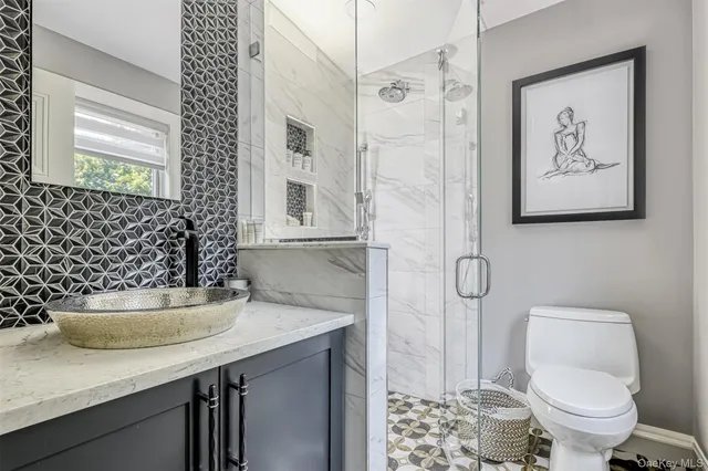 a bathroom with a sink and a toilet