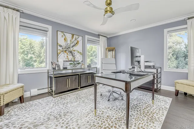 a living room with granite countertop furniture a rug and a window