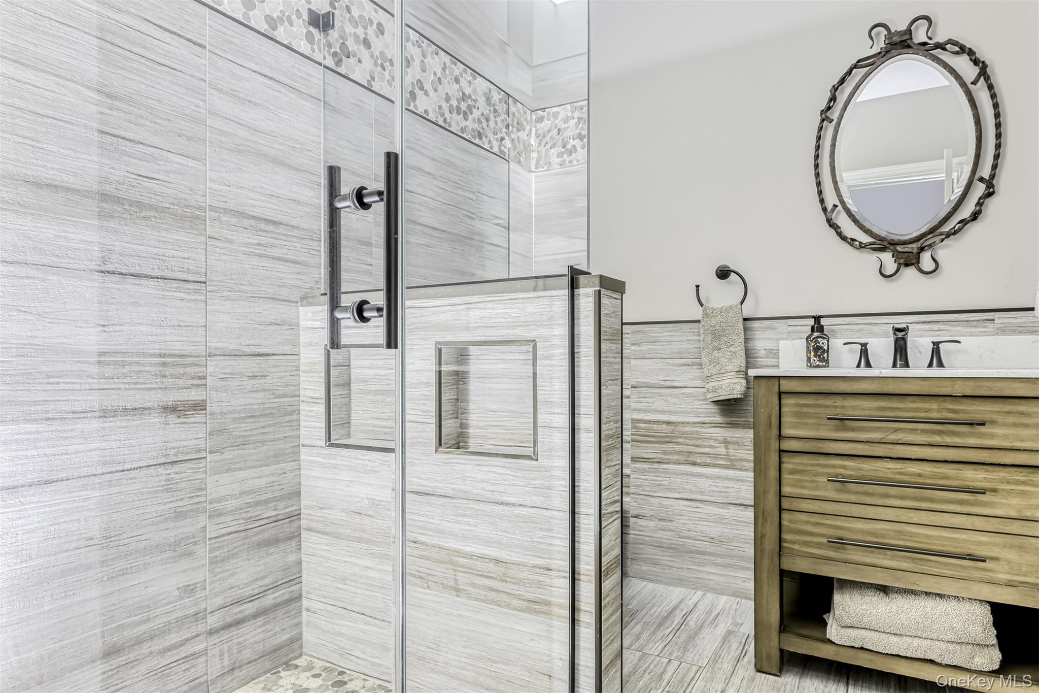 6 Par Road Suffern, NY 10901 - Photo 26 of 41 a bathroom with a sink and a mirror