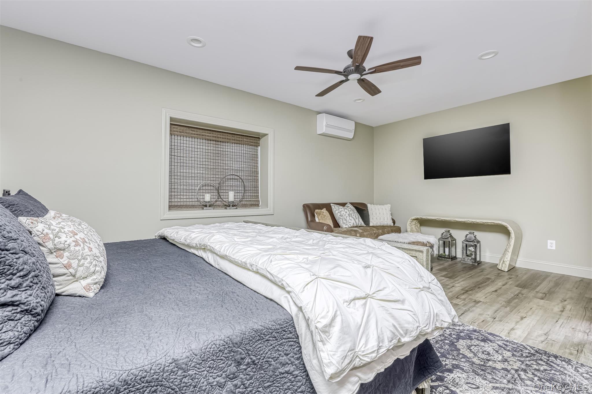 6 Par Road Suffern, NY 10901 - Photo 27 of 41 a bedroom with a bed and a flat screen tv