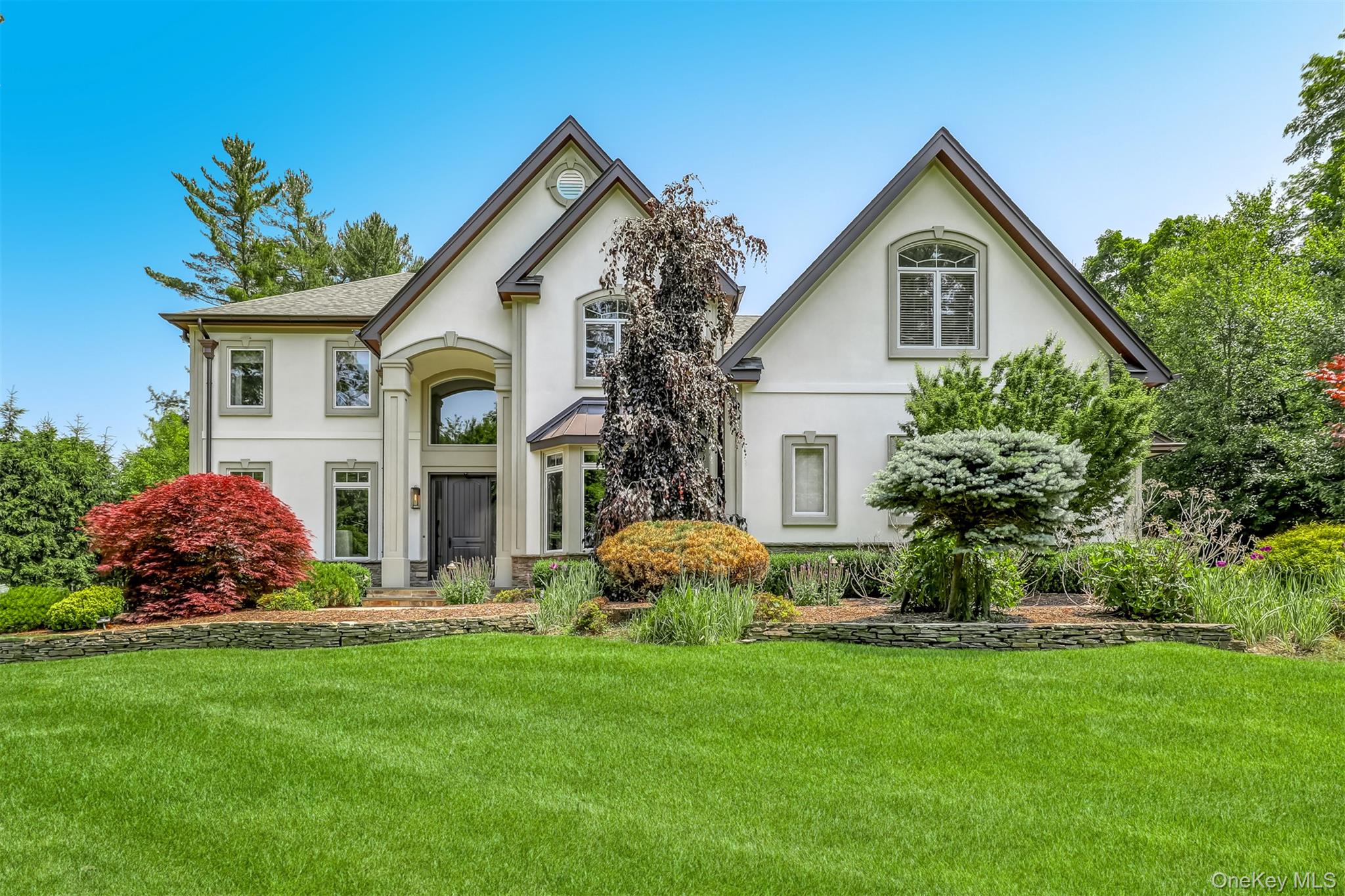 6 Par Road Suffern, NY 10901 - Photo 3 of 41 a front view of house with yard and green space