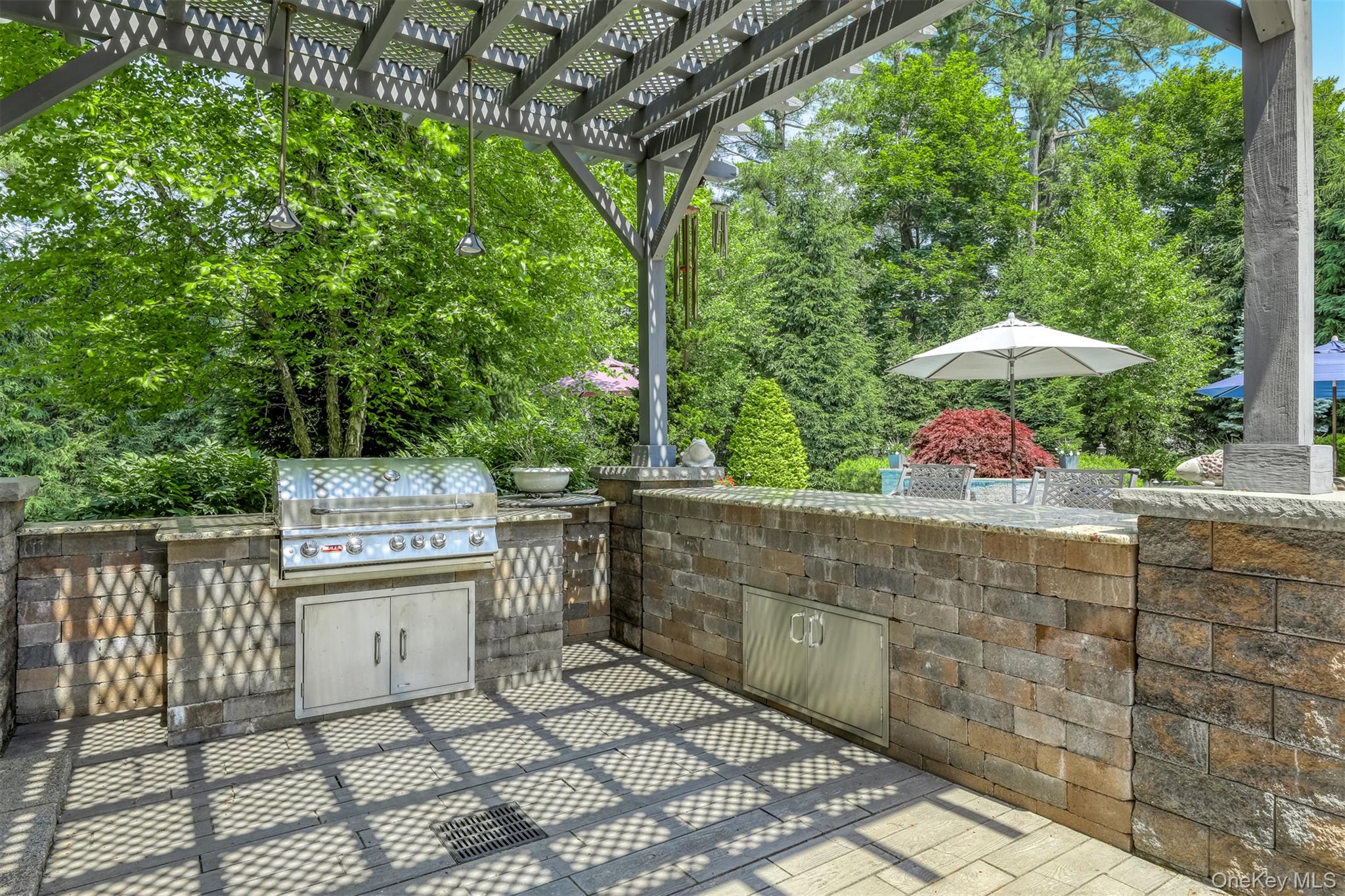 6 Par Road Suffern, NY 10901 - Photo 34 of 41 a view of a garden with an outdoor seating