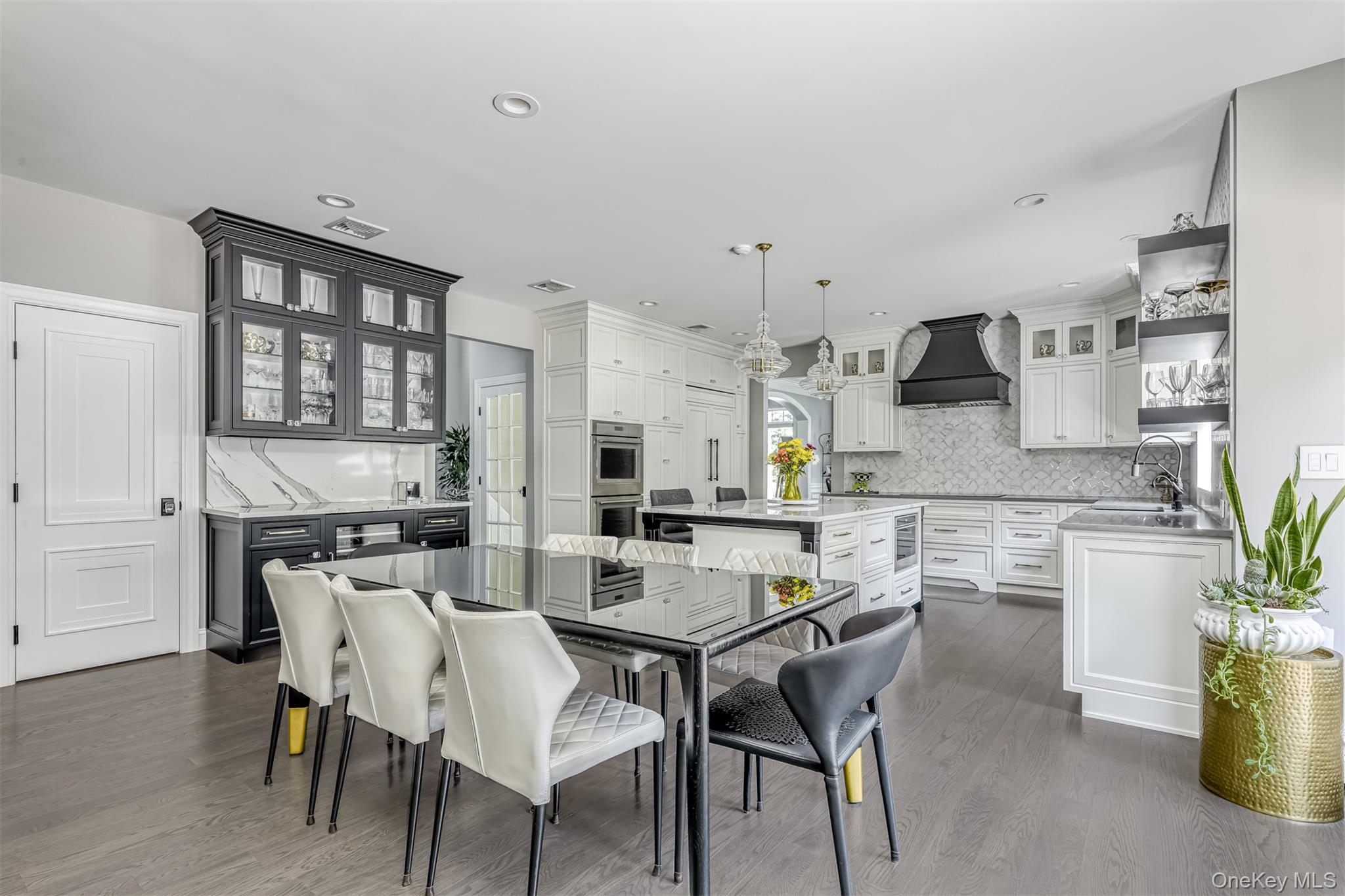 6 Par Road Suffern, NY 10901 - Photo 9 of 41 a kitchen with a table chairs stove and cabinets