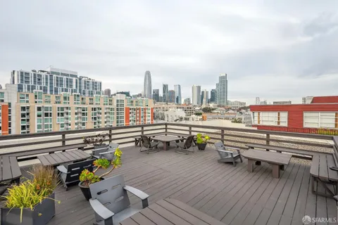 a view of a terrace with sitting area