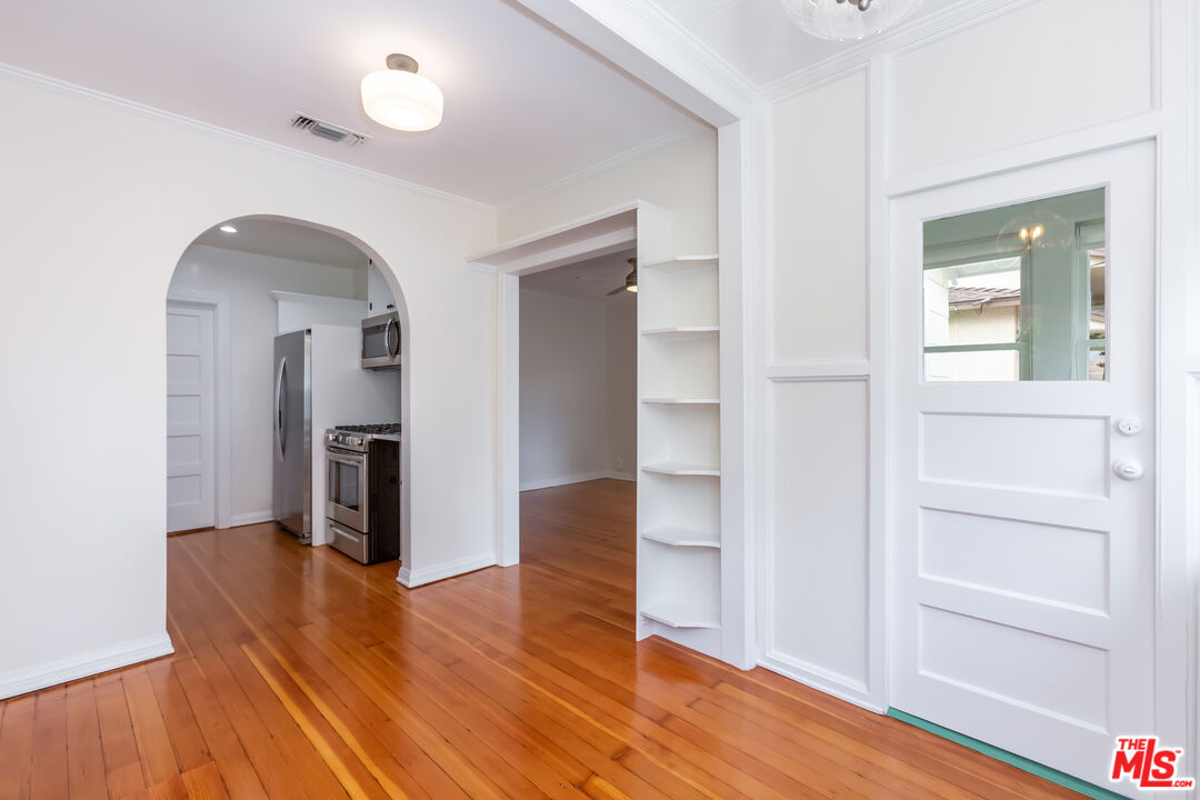 9980 Braddock Drive Culver City, CA 90232 - Photo 11 of 29 wooden floor in an empty room and a mirror