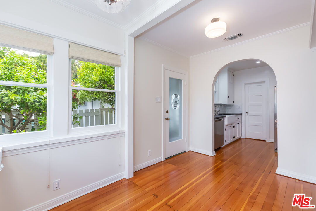9980 Braddock Drive Culver City, CA 90232 - Photo 12 of 29 a view of empty room with wooden floor and fan