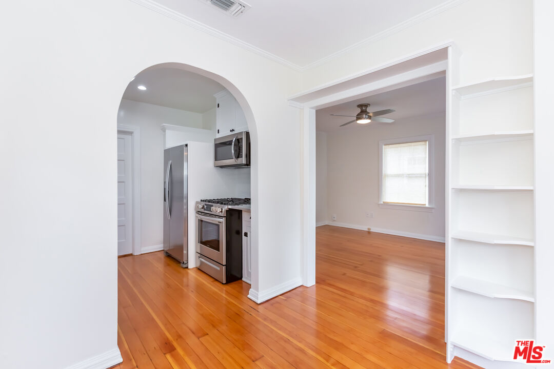 9980 Braddock Drive Culver City, CA 90232 - Photo 13 of 29 a kitchen with stainless steel appliances a refrigerator and a stove top oven