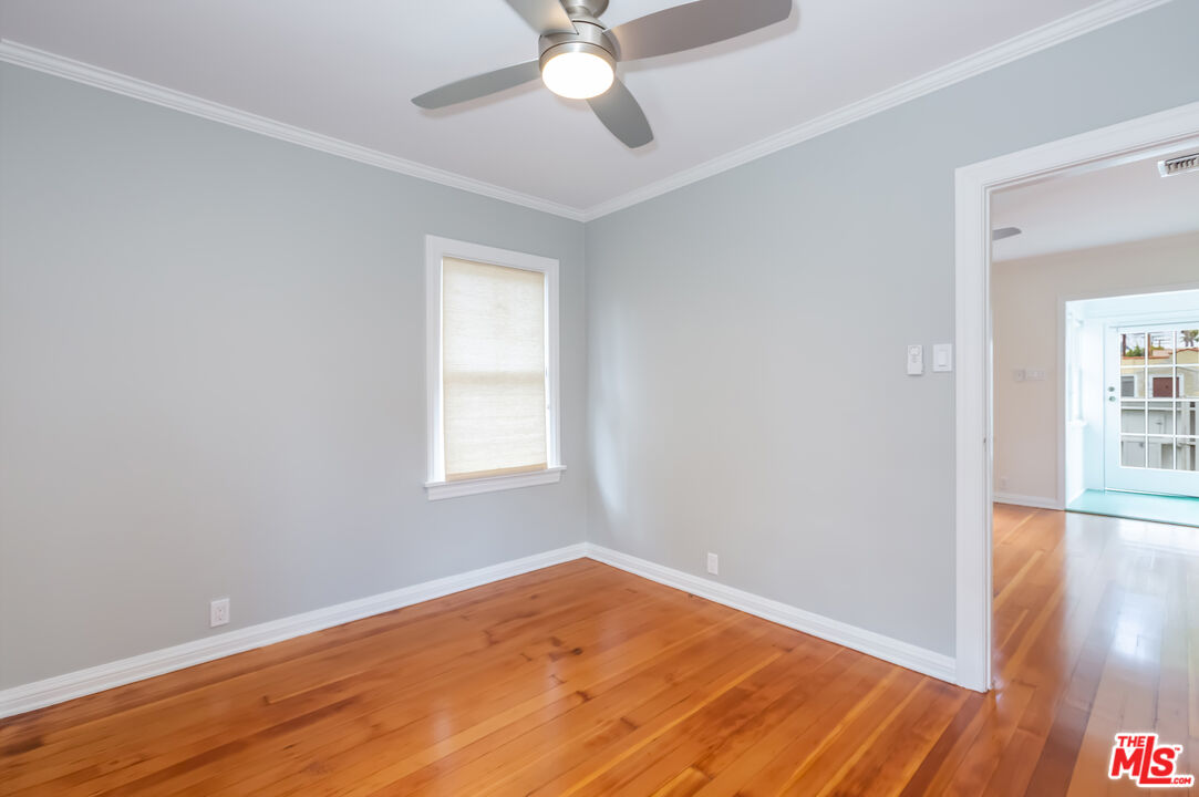 9980 Braddock Drive Culver City, CA 90232 - Photo 20 of 29 wooden floor in an empty room with a window