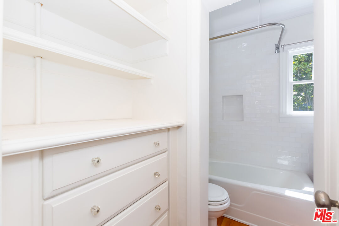 9980 Braddock Drive Culver City, CA 90232 - Photo 26 of 29 a bathroom with a sink a toilet and shower