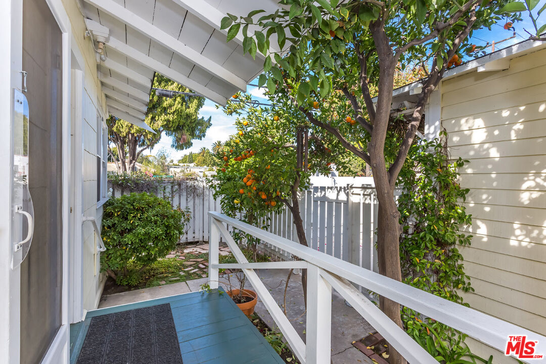 9980 Braddock Drive Culver City, CA 90232 - Photo 5 of 29 a view of balcony with wooden floor and fence