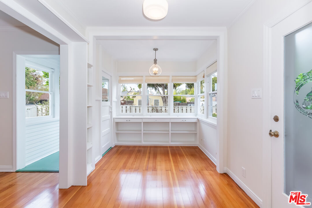 9980 Braddock Drive Culver City, CA 90232 - Photo 9 of 29 a view of room with window and wooden floor