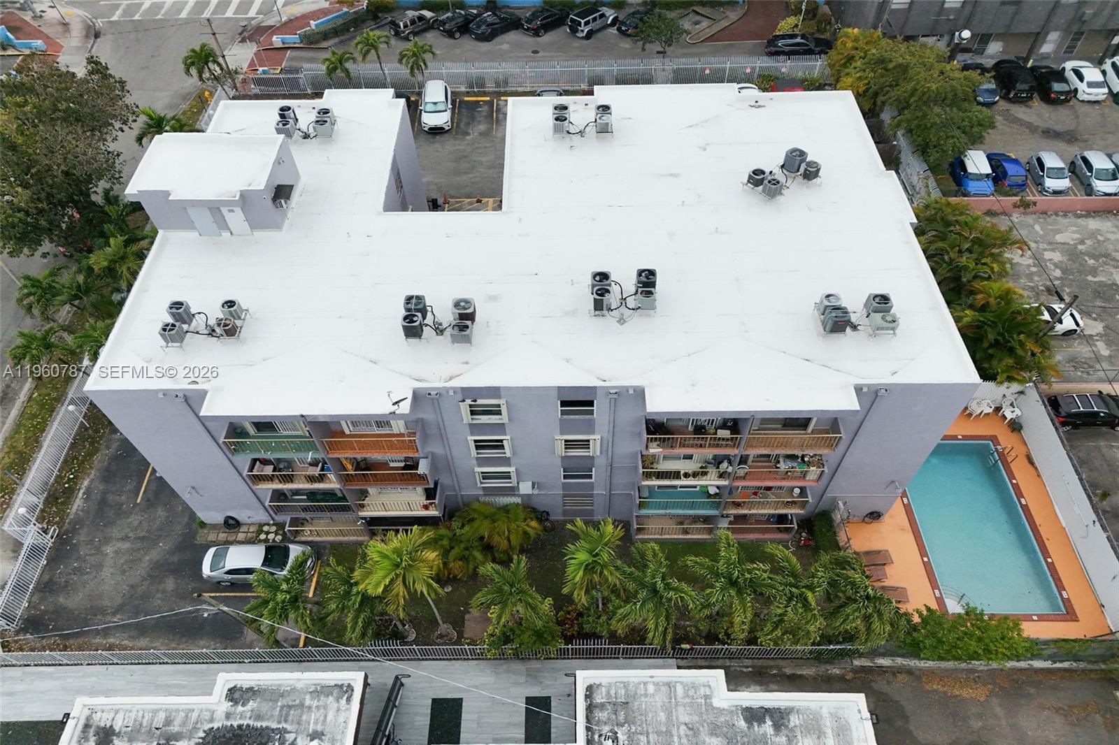 1661 Southwest 3rd Street, Unit 25 Miami, FL 33135 - Photo 20 of 24 an aerial view of residential houses with outdoor space