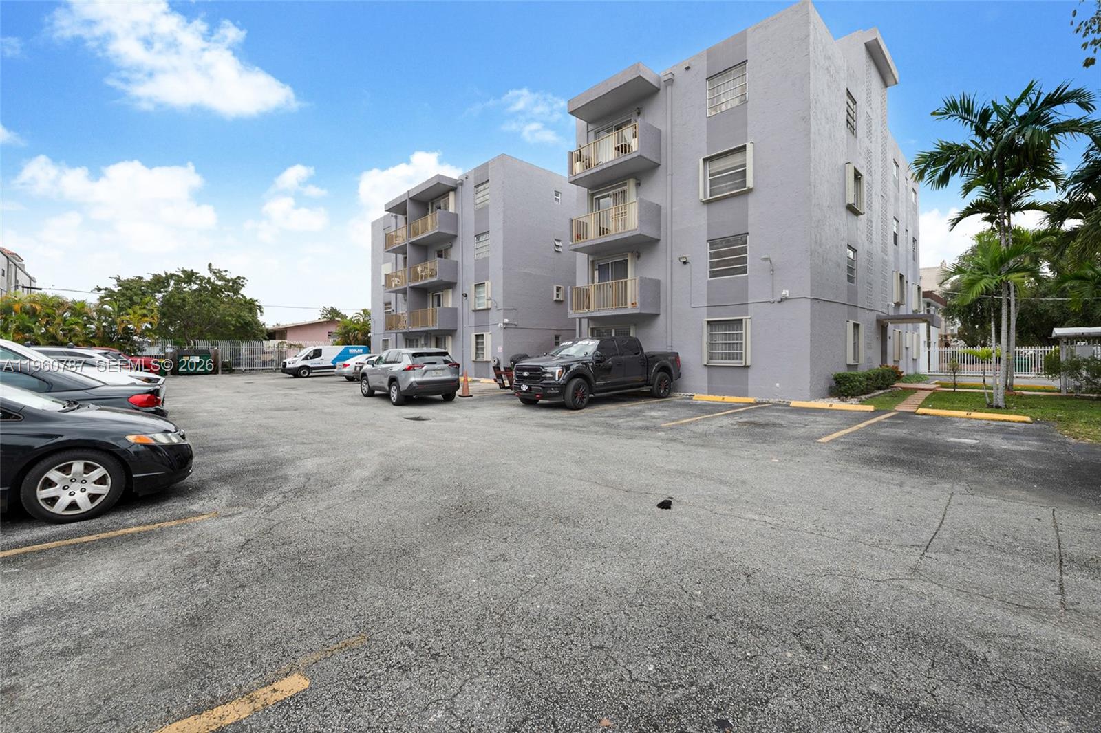 1661 Southwest 3rd Street, Unit 25 Miami, FL 33135 - Photo 21 of 24 a view of a street with cars