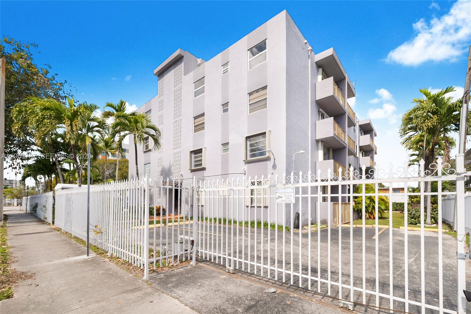 1661 Southwest 3rd Street, Unit 25 Miami, FL 33135 - Photo 3 of 24 a view of a house with a small yard and plants