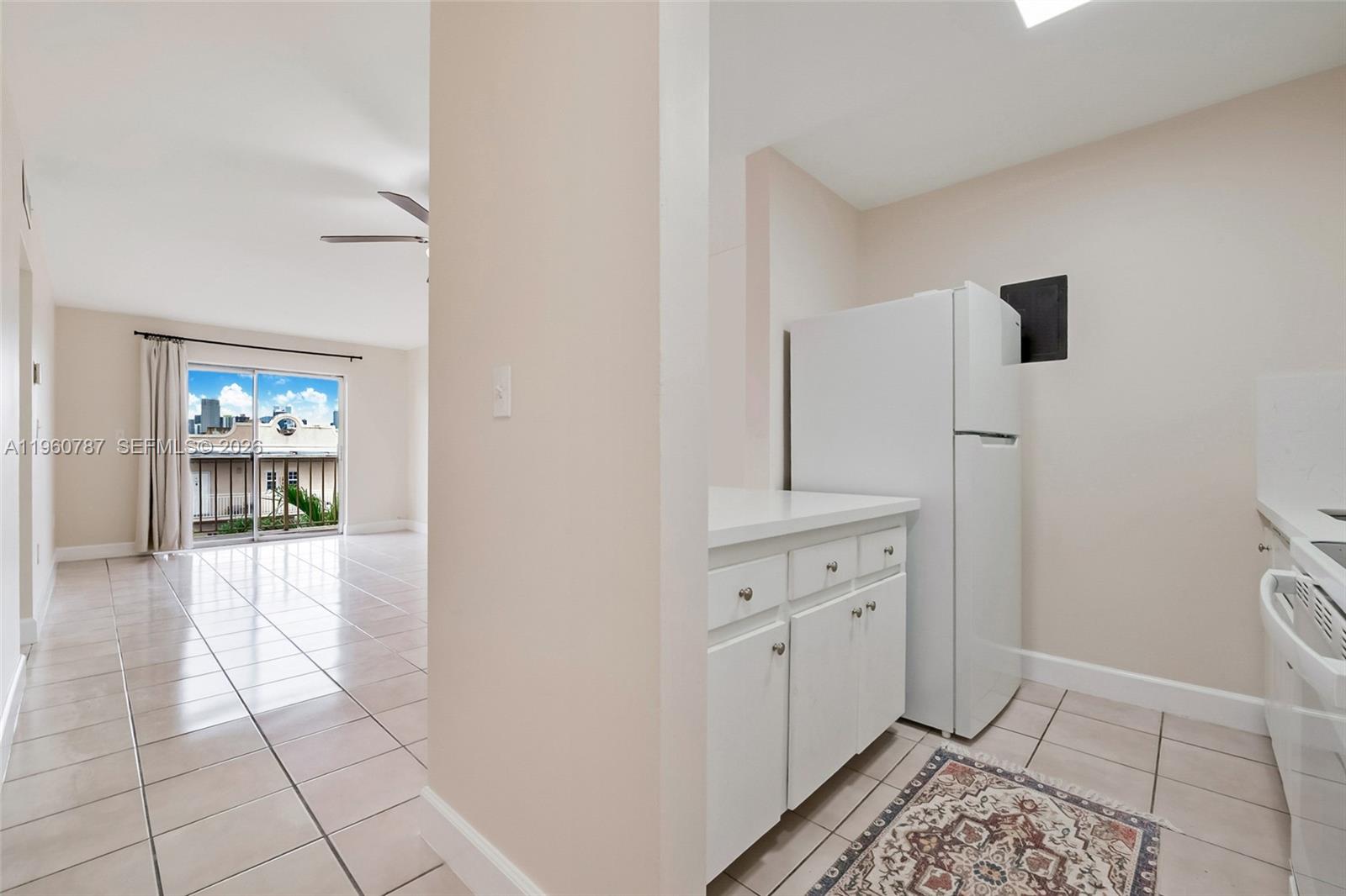 1661 Southwest 3rd Street, Unit 25 Miami, FL 33135 - Photo 7 of 24 a bathroom with a sink and a mirror