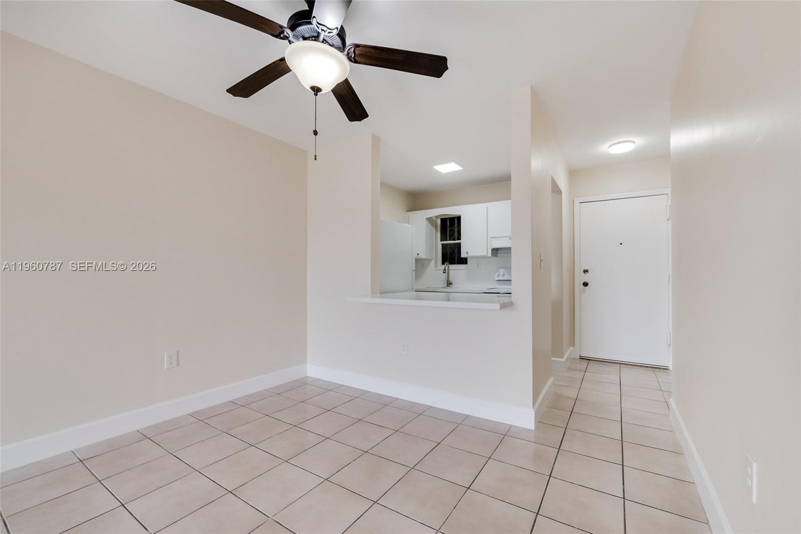 1661 Southwest 3rd Street, Unit 25 Miami, FL 33135 - Photo 8 of 24 a view of an empty room and window