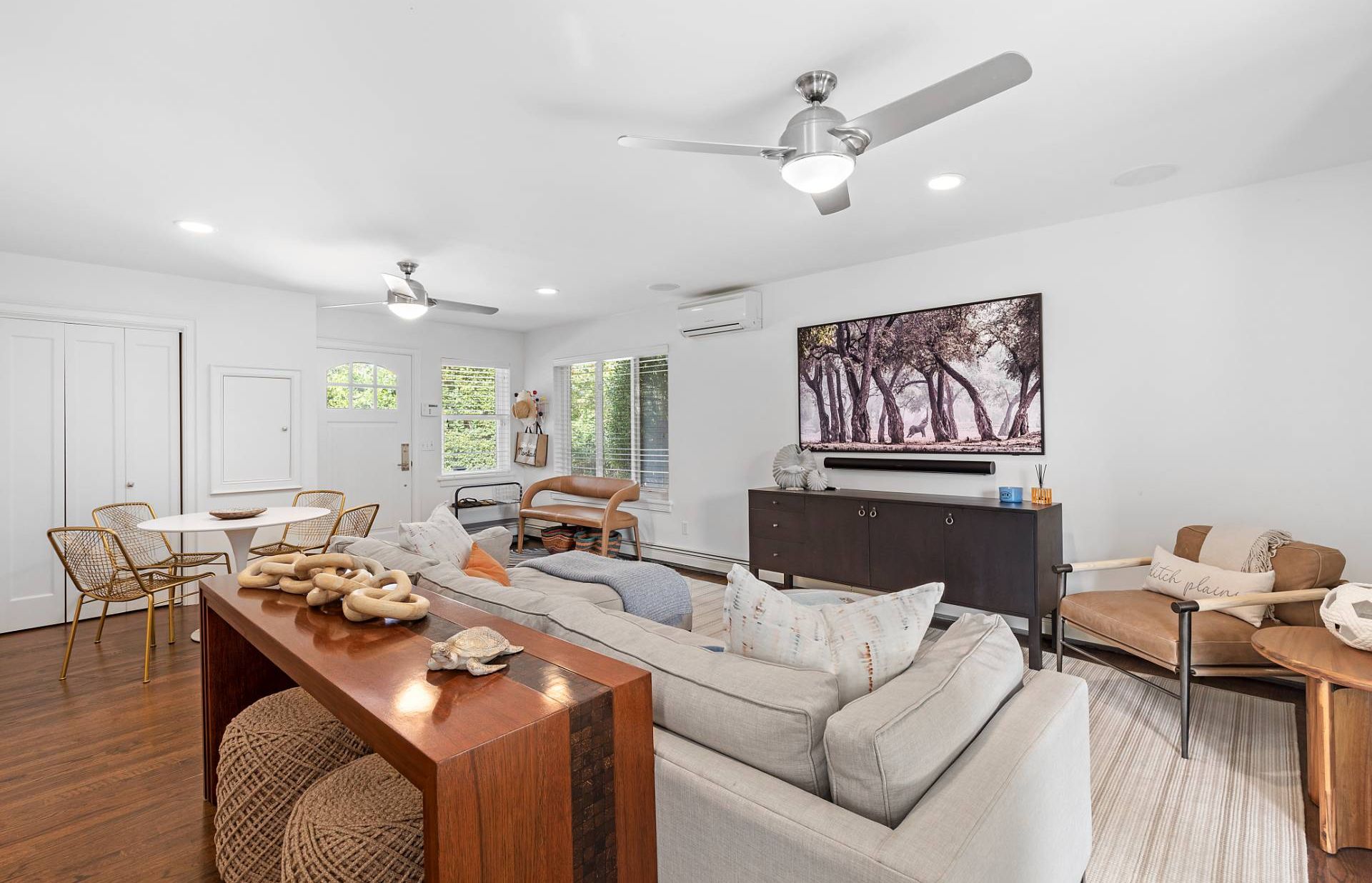 28 Ditch Plains Road Montauk, NY 11954 - Photo 7 of 30 a living room with furniture and a flat screen tv