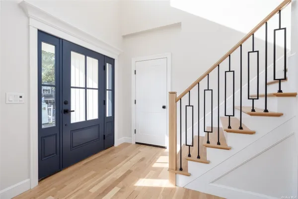 a view of an entryway with staircase