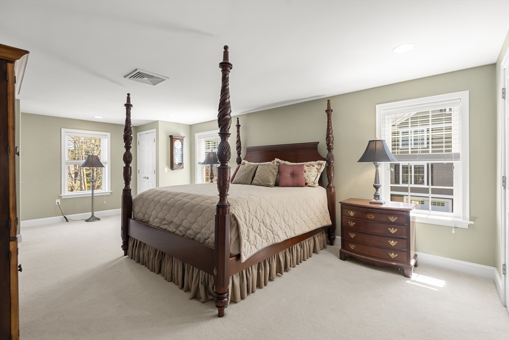 62 Leggs Hill Road Marblehead, MA 01945 - Photo 17 of 36 a bedroom with a bed window and a dresser