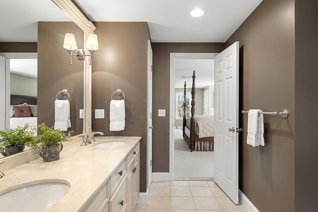62 Leggs Hill Road Marblehead, MA 01945 - Photo 18 of 36 a bathroom with a sink and a mirror