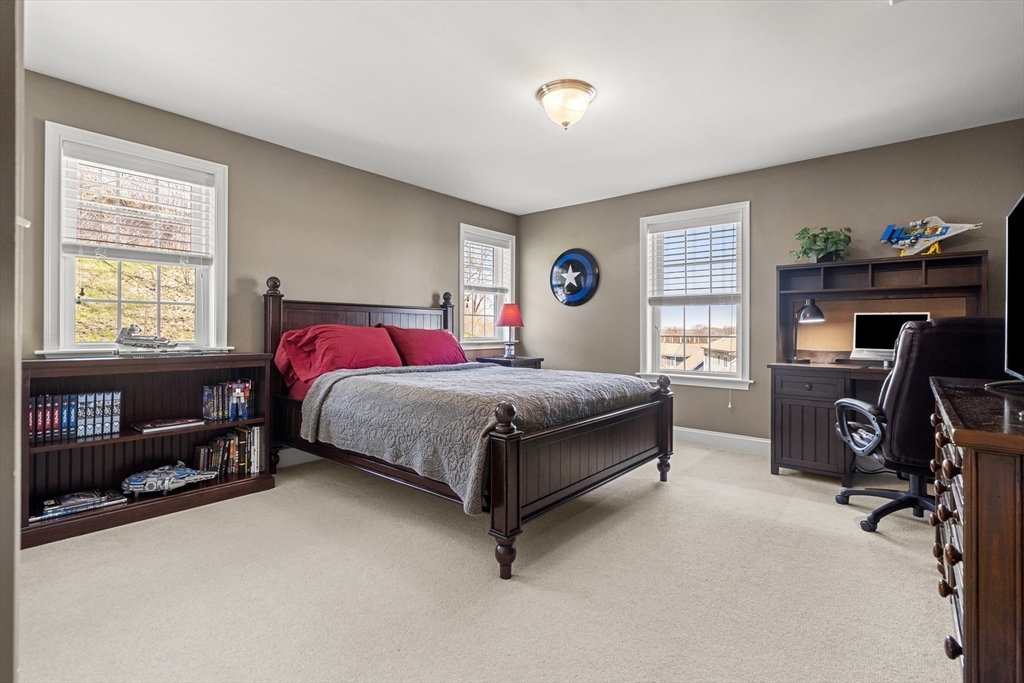 62 Leggs Hill Road Marblehead, MA 01945 - Photo 19 of 36 a bedroom with a bed and a window