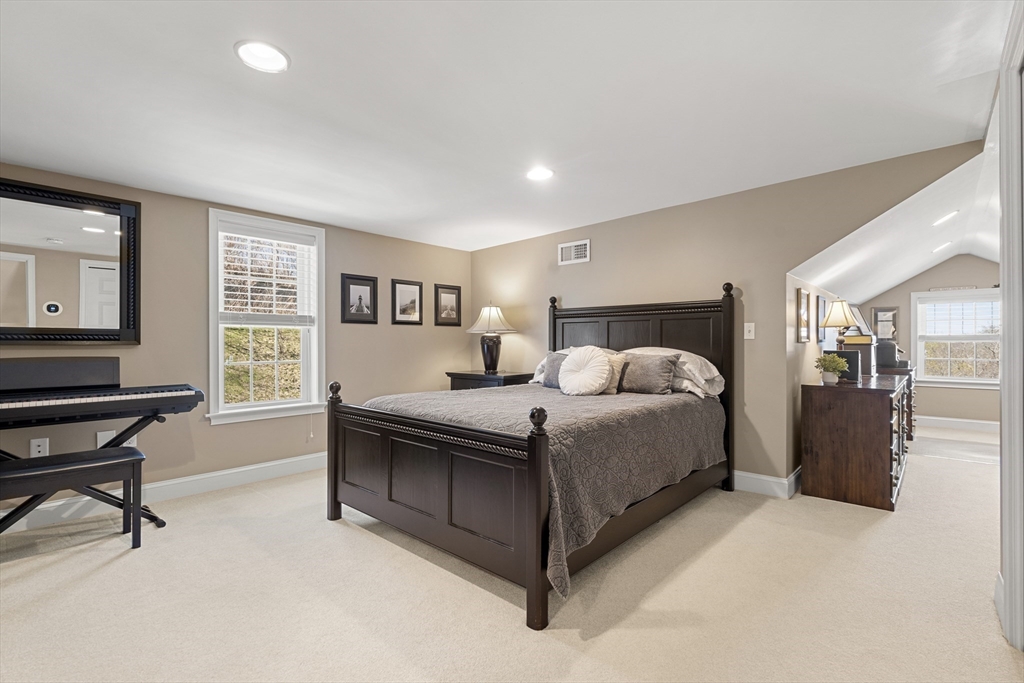 62 Leggs Hill Road Marblehead, MA 01945 - Photo 24 of 36 a bedroom with a bed and a desk