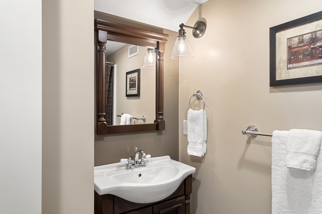 62 Leggs Hill Road Marblehead, MA 01945 - Photo 26 of 36 a bathroom with a sink and mirror