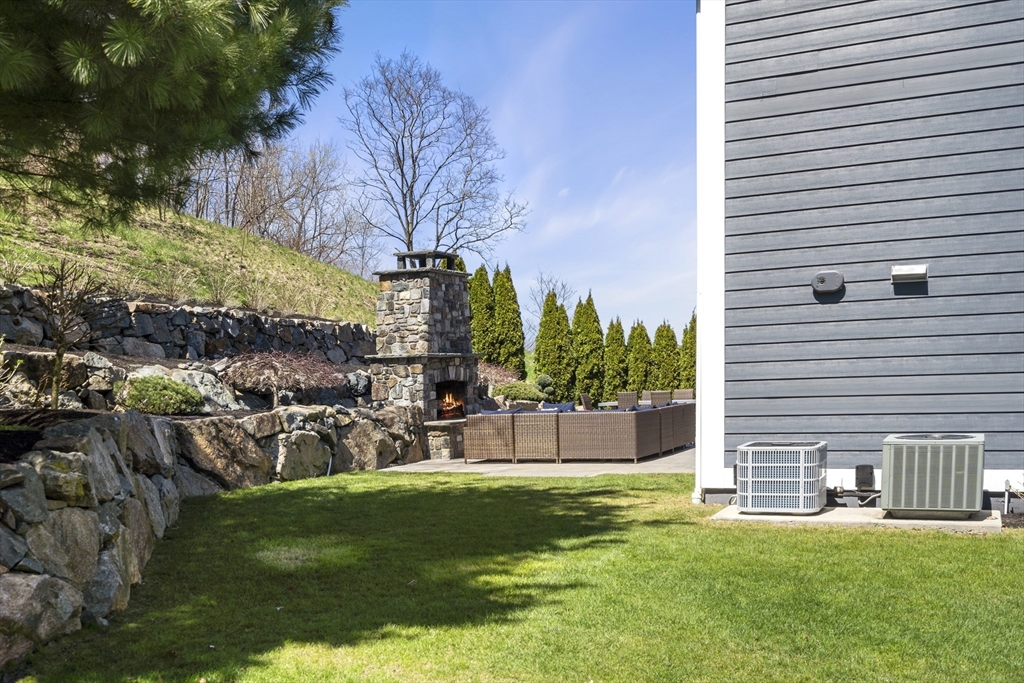62 Leggs Hill Road Marblehead, MA 01945 - Photo 31 of 36 a view of a house with a yard and sitting area