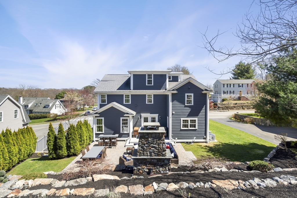 62 Leggs Hill Road Marblehead, MA 01945 - Photo 35 of 36 a front view of a residential apartment building with a yard