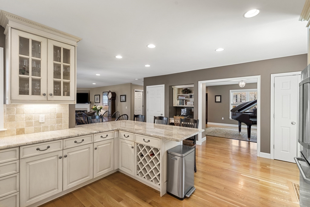 62 Leggs Hill Road Marblehead, MA 01945 - Photo 7 of 36 a large kitchen with stainless steel appliances granite countertop a lot of counter space and wooden floors