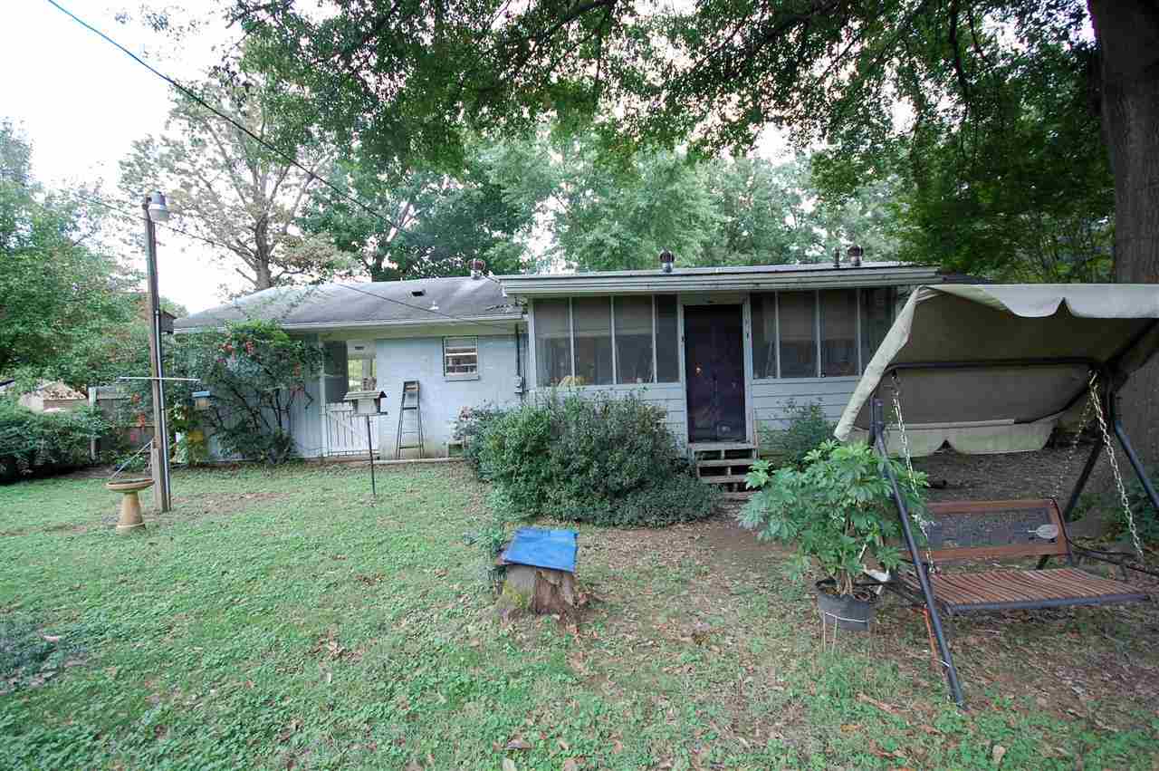 3029 Sienna Road Bartlett, TN 38134 - Photo 20 of 20 a view of a house with backyard sitting area and garden