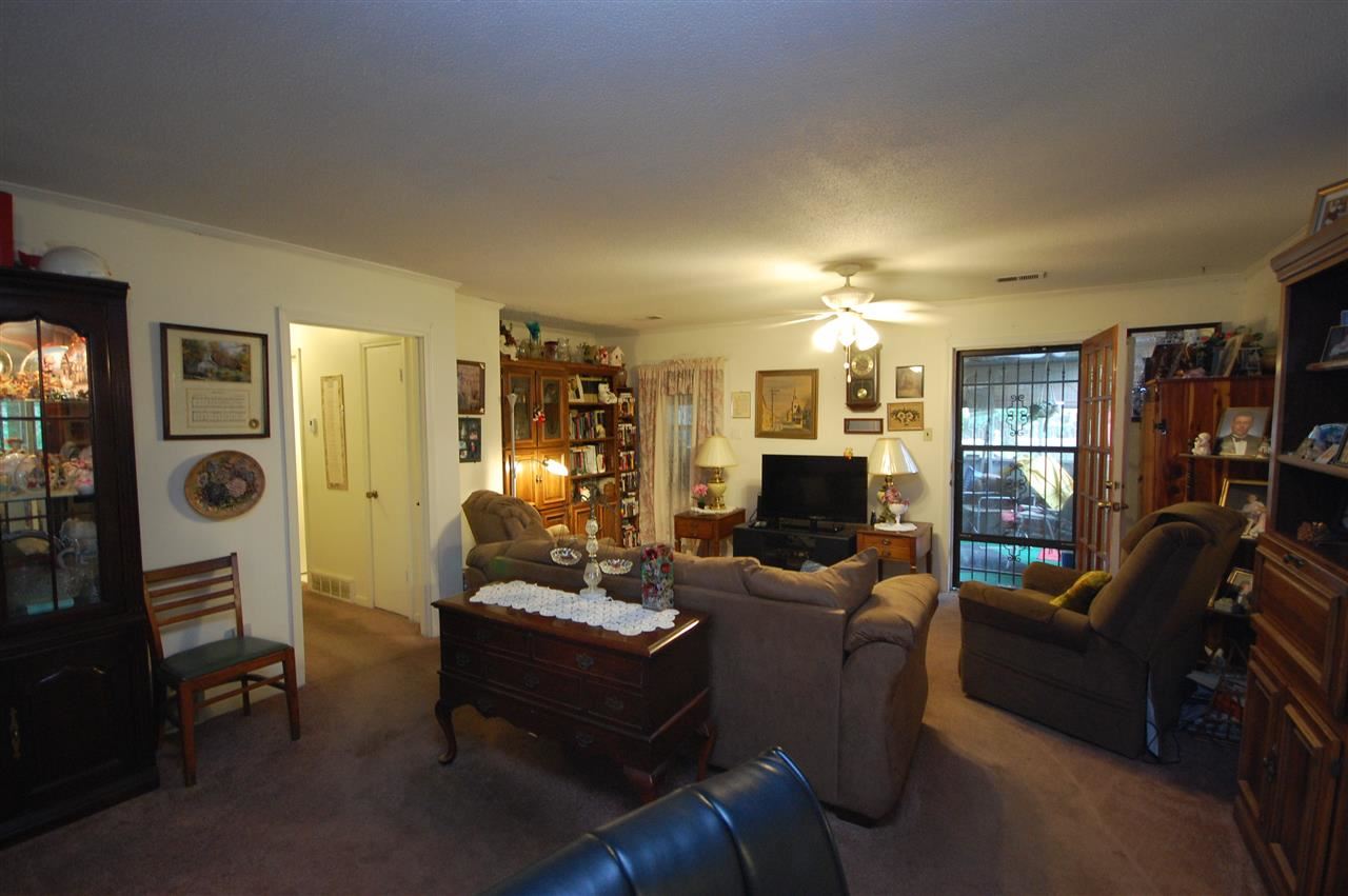 3029 Sienna Road Bartlett, TN 38134 - Photo 2 of 20 a living room with furniture and a flat screen tv
