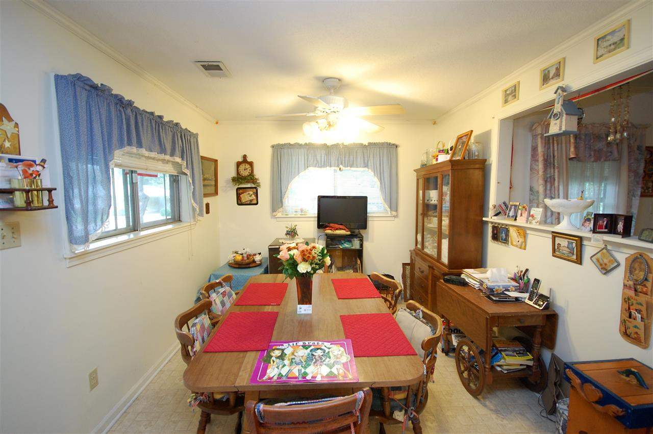 3029 Sienna Road Bartlett, TN 38134 - Photo 9 of 20 a view of a dining room with furniture and chandelier