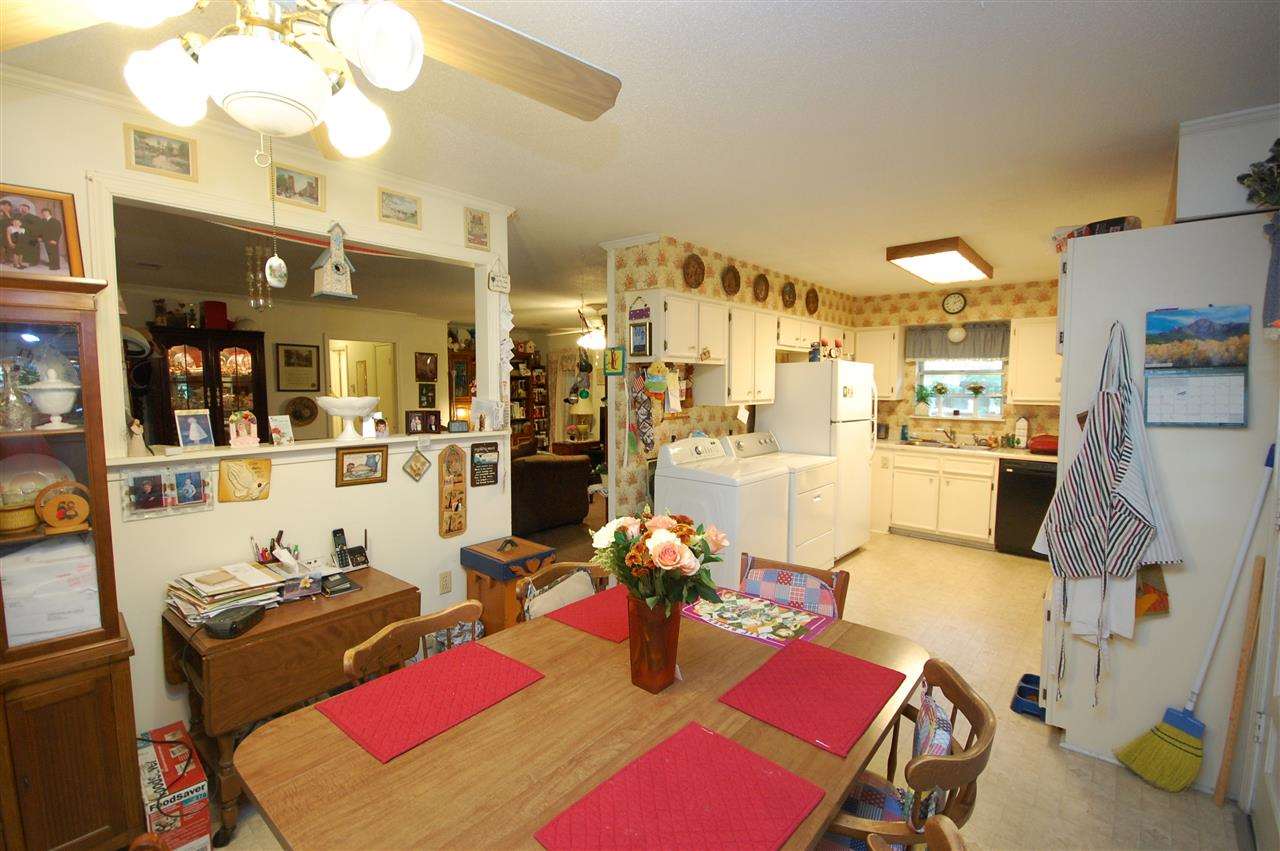 3029 Sienna Road Bartlett, TN 38134 - Photo 10 of 20 a room with furniture and kitchen view